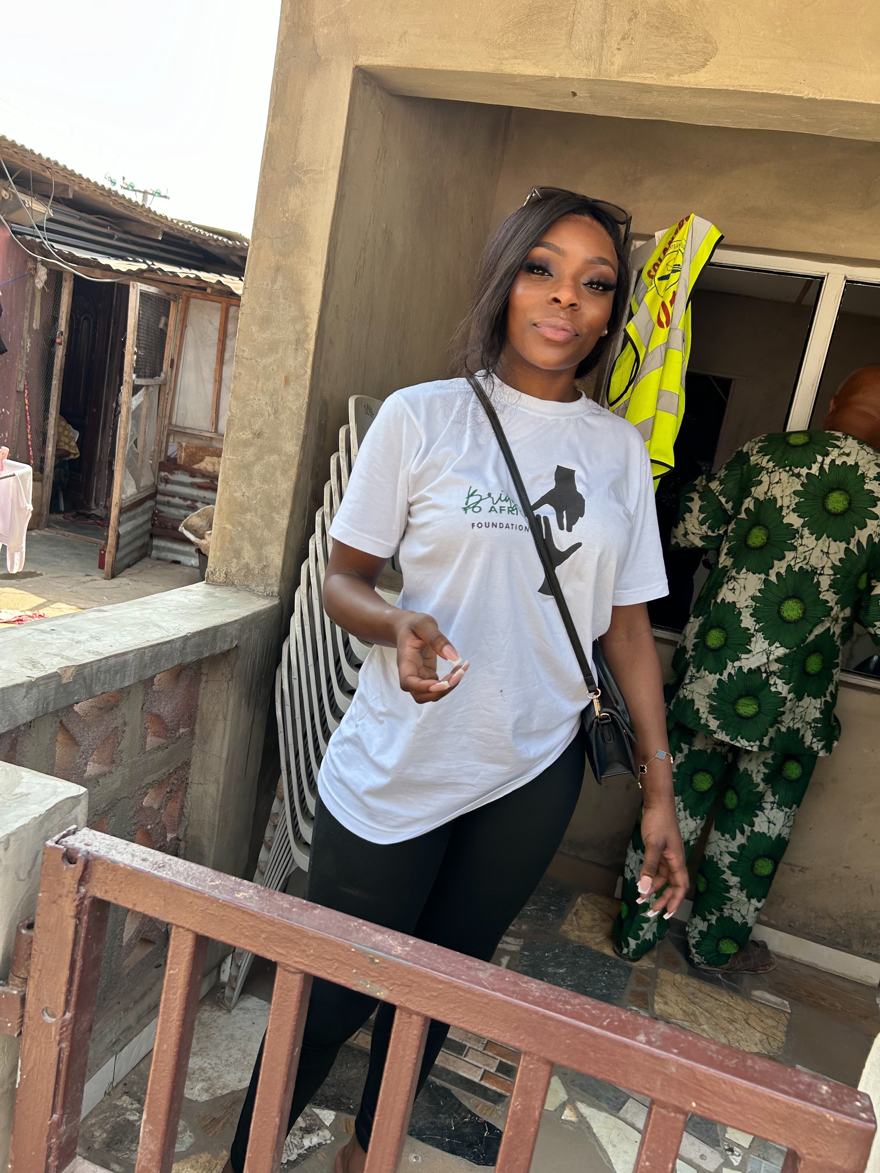 Volunteer in a Bridge to Africa Foundation t-shirt during the outreach